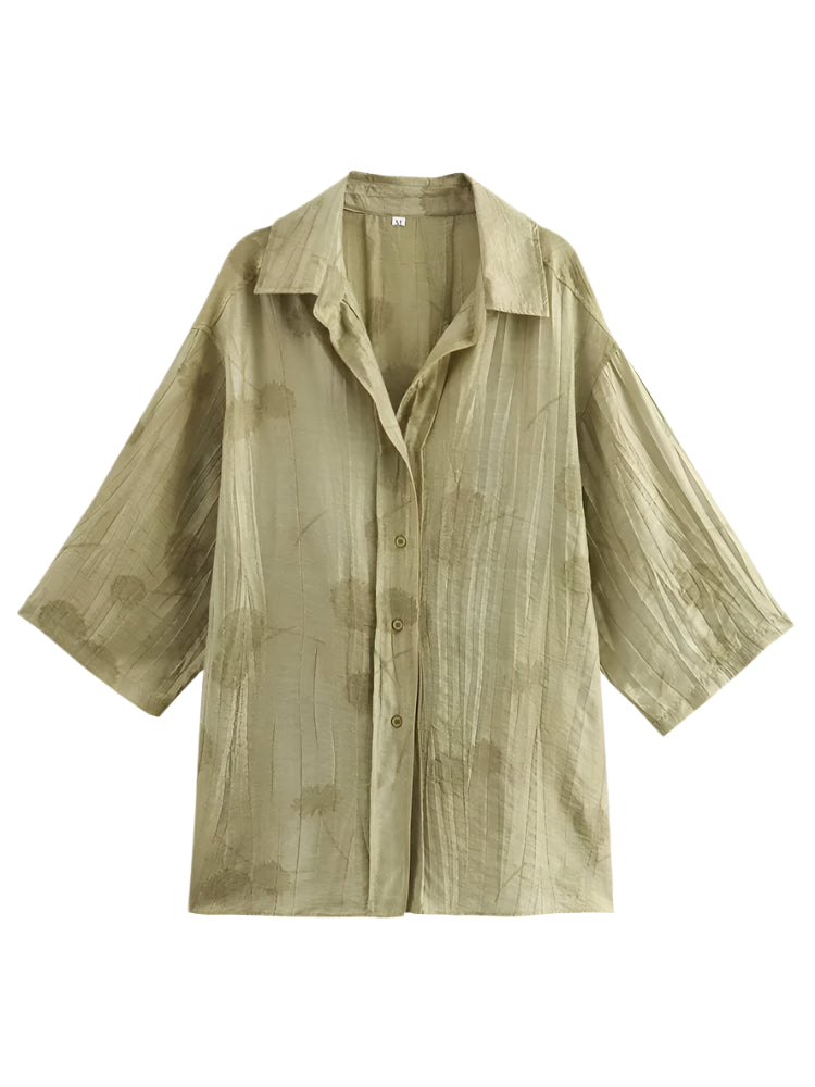 Two-piece dress pants and half-sleeved blouse.