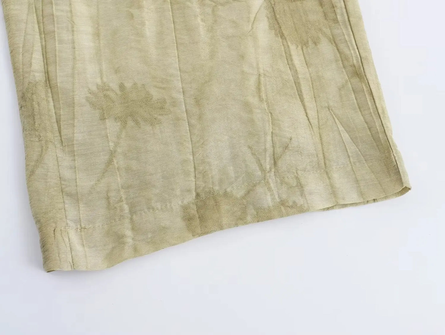 Two-piece dress pants and half-sleeved blouse.