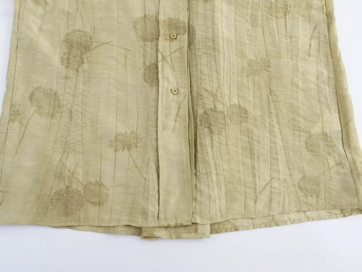 Two-piece dress pants and half-sleeved blouse.