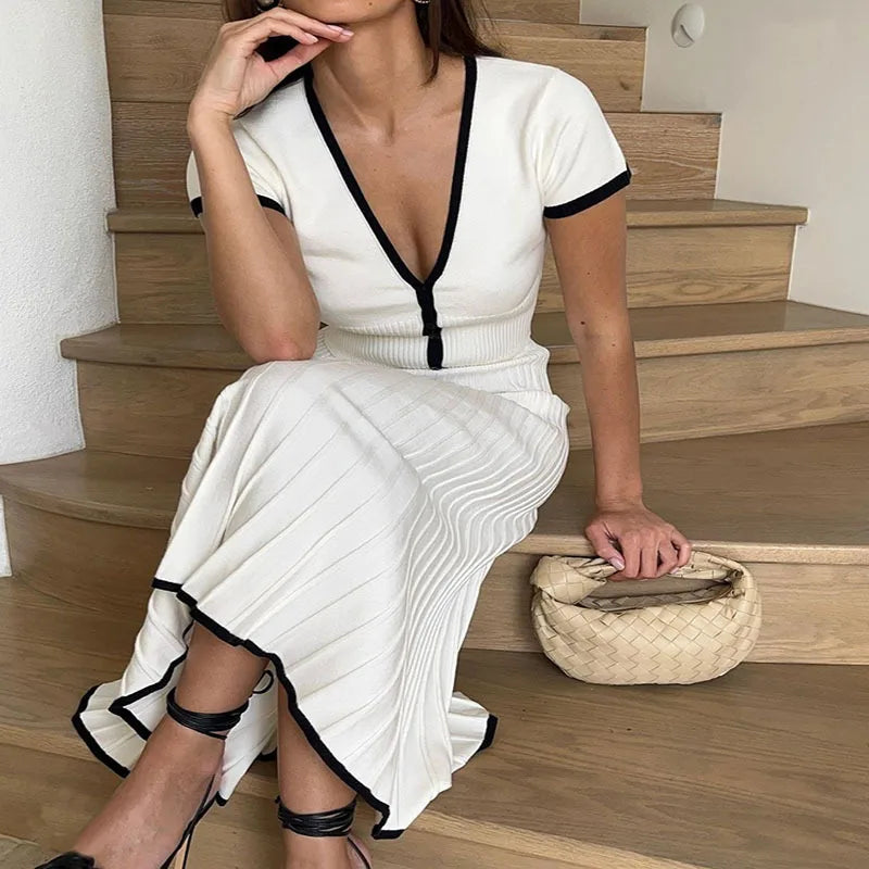 White long Skirt, Short Sleeve V-neck Crop Top.