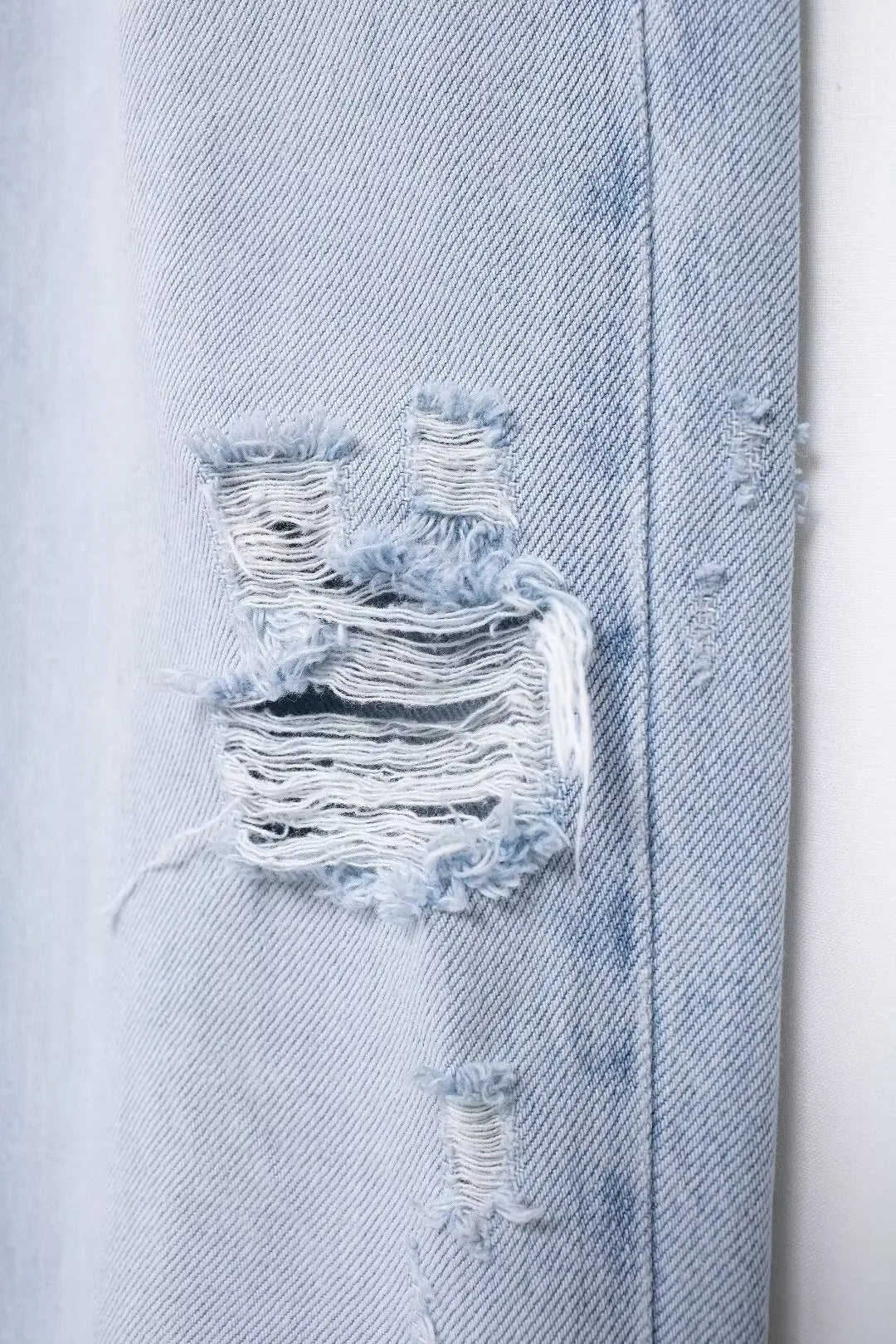 Blue Ripped Denim Jeans.