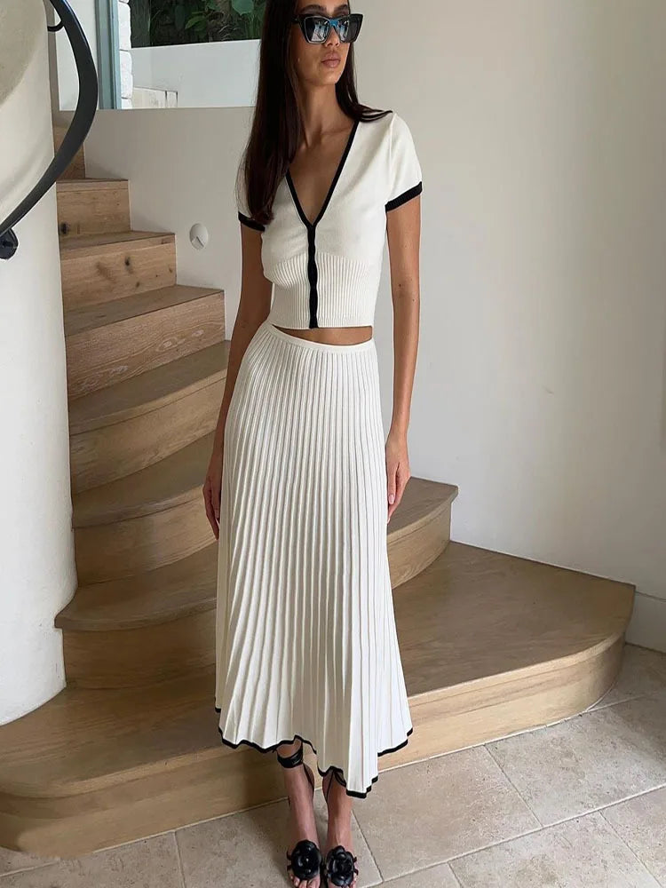 White long Skirt, Short Sleeve V-neck Crop Top.